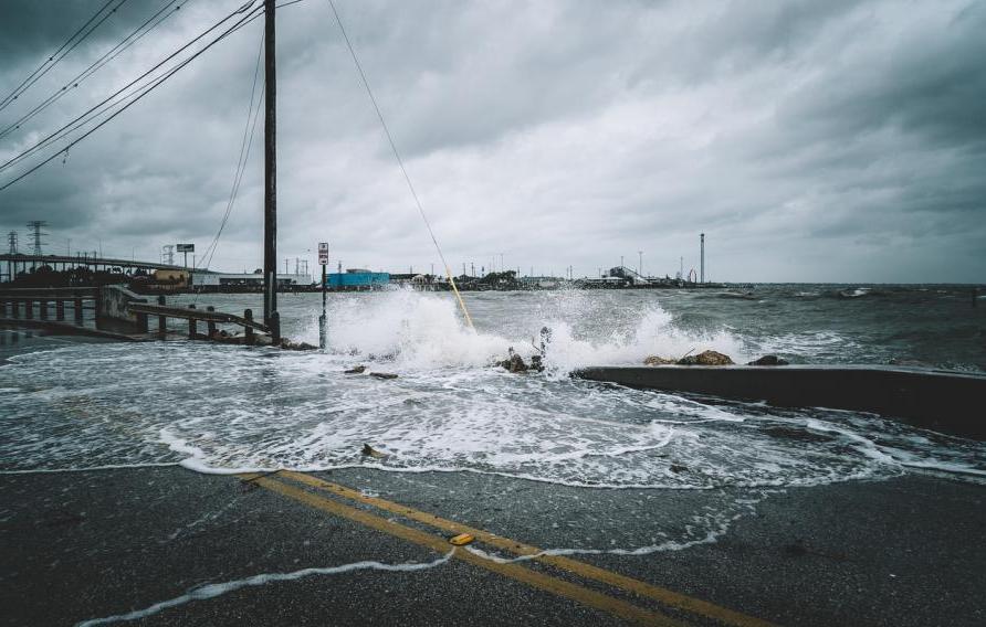 Water crashing over bridge during Hurricane Harvey in Kemah Texas